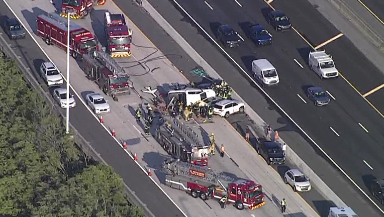 Photo: Aerial view of damaged vehicles and fire engines blocking lanes on I-275