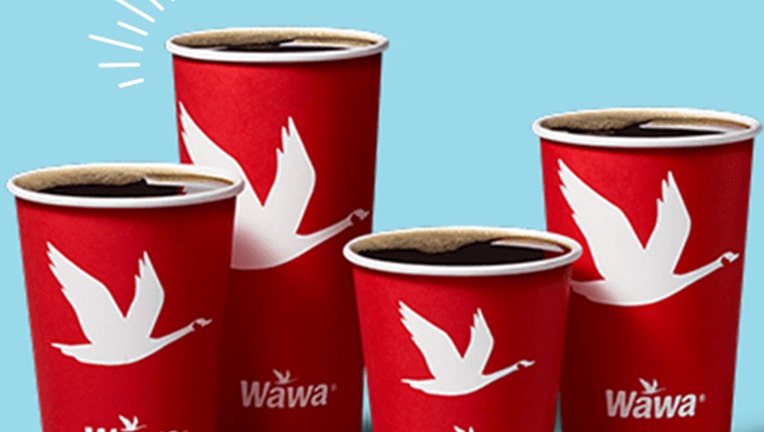 Photo: Four red cups with white Wawa logos printed on them