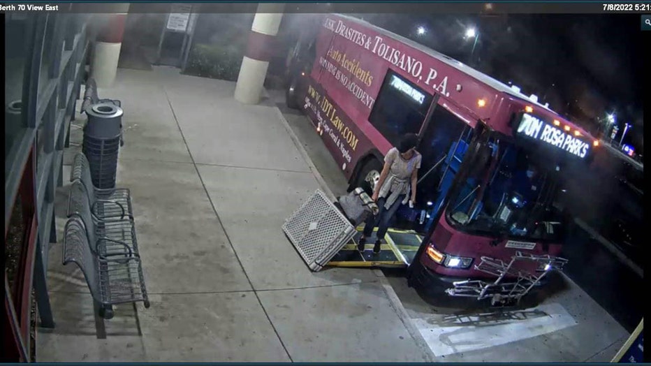 Missing mom Erica Johnson boarding bus