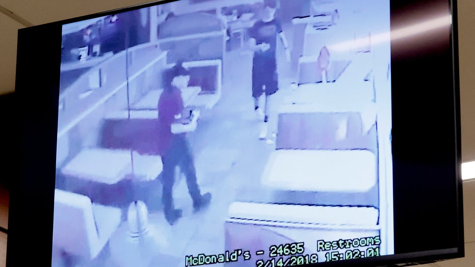 Photo: Surveillance video shown in court of Nikolas Cruz in Mcdonald's encountering student John Wilford shortly after the shooting during the penalty phase of Nikolas Cruz's trial at the Broward County Courthouse on July 21, 2022 in Fort Lauderdale, Florida. 
