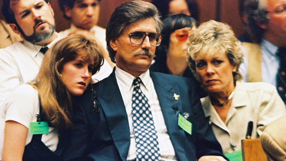 Fred Goldman (C), father of Ronald Goldman, his daughter Kim (L) and wife Patty listen to testimony during a preliminary hearing following the murders of Ronald and O.J. Simpson's ex-wife Nicole Brown Simpson July 7, 1994 in Los Angeles.