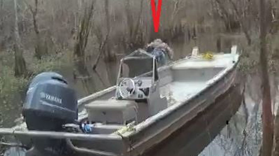 Florida man jumping off boat to avoid arrest.