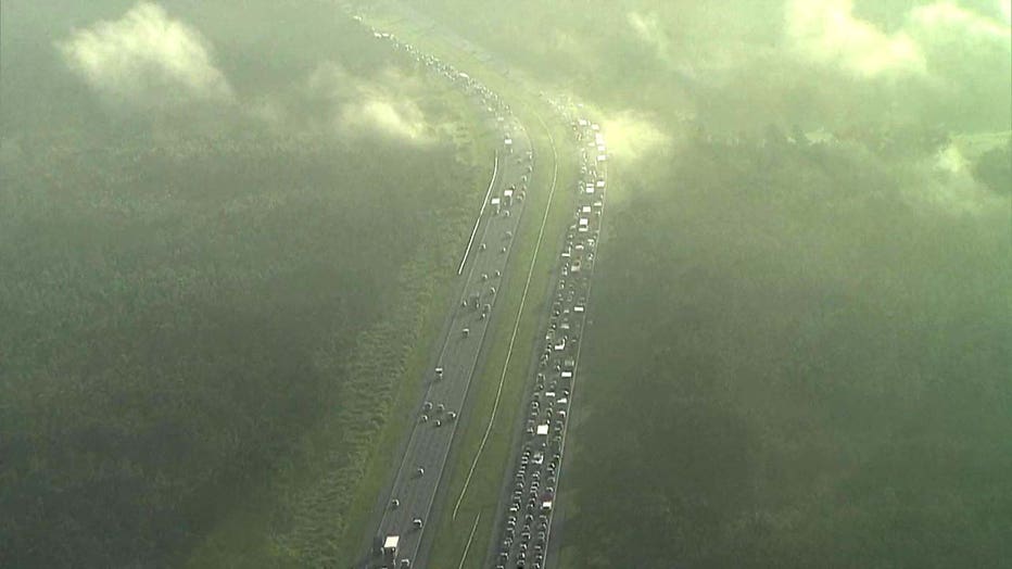 Photo: Aerial view shows miles of traffic in the eastbound lanes of I-4.