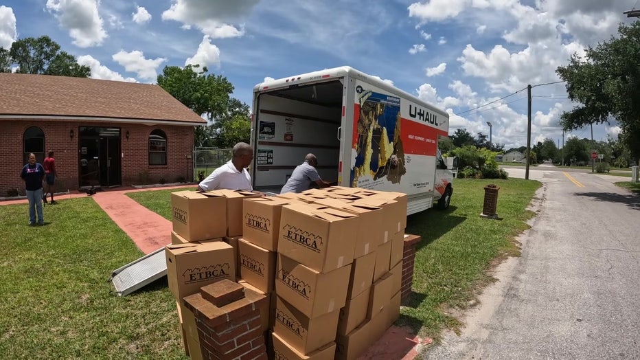 Boxes outside UHaul truck for volunteers with Bags of Blessings