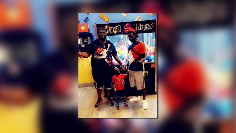 Photo of man killed along I-75 with child and friend.