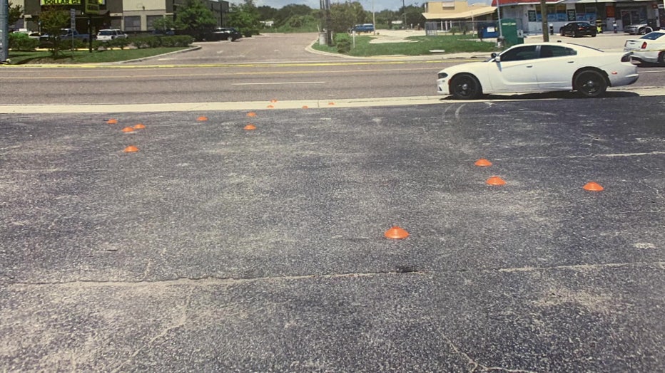 Bullet markings outside a Tampa pawn shop.
