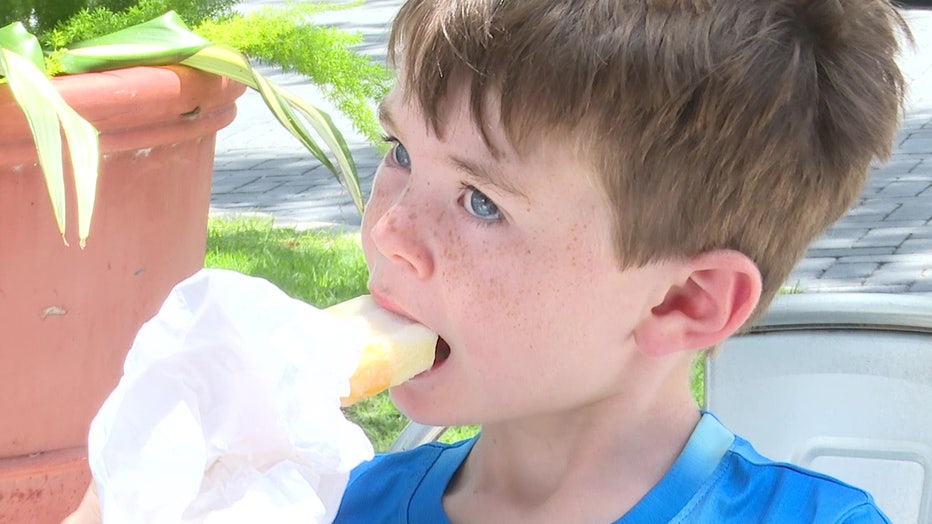 Child eating popsicle