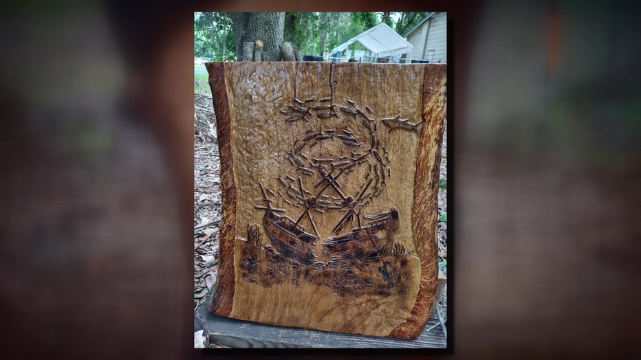 Art carved into tree.