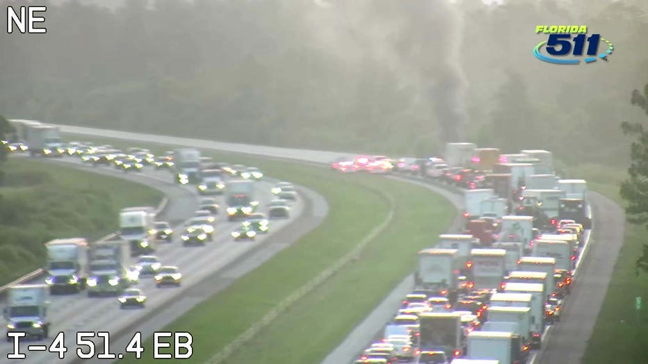 Photo: FDOT screenshot shows smoke rising from a vehicle in the eastbound lanes of I-4.