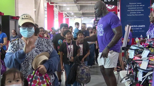 WWE star Titus O’Neil helps 30,000 kids get ready to go back to school