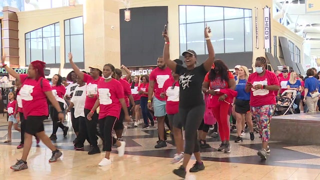 Women ‘dressed for success’ raise nearly $25,000 for professional organization