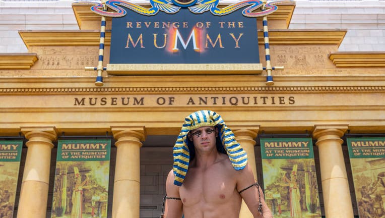 Male entertainer outside the 'Revenge of the Mummy'