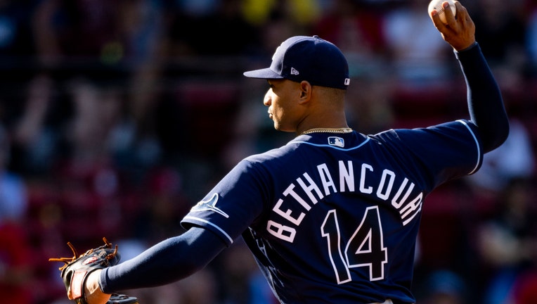 Christian Bethancourt #14 of the Tampa Bay Rays pitches during the ninth inning of a game against the Boston Red Sox on August 28, 2022 at Fenway Park in Boston, Massachusetts.