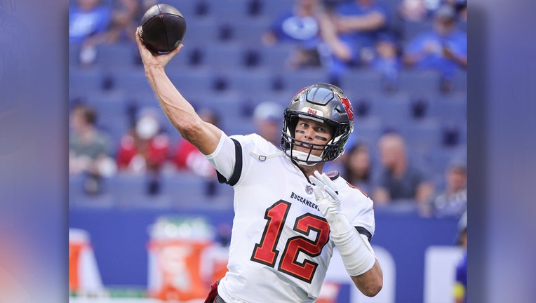 Tom Brady #12 of Tampa Bay Buccaneers warms up before the game against the Indianapolis Colts at Lucas Oil Stadium on August 27, 2022 in Indianapolis, Indiana.