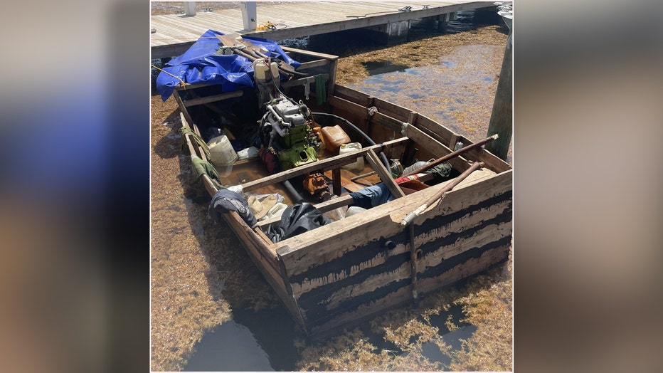 Empty makeshift vessel used by migrants that ran aground near Key Largo