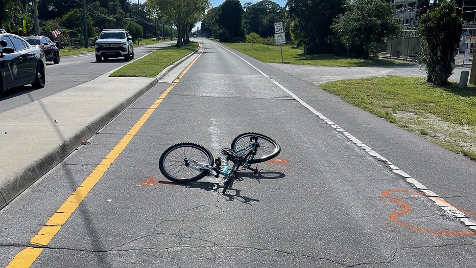 FHP-provided photo of girl's bicycle left on roadway outside Pine View school after hit-and-run crash
