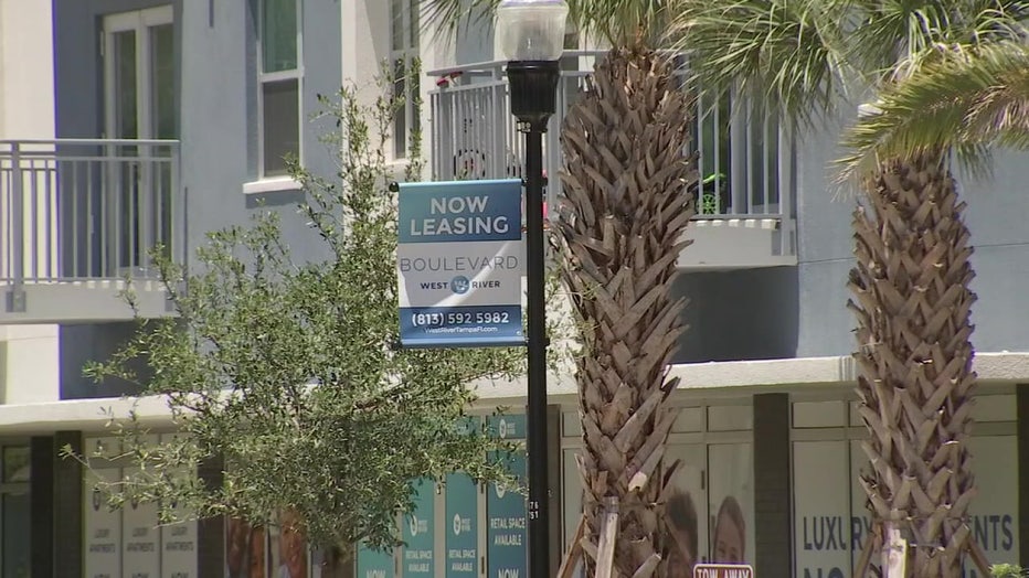 Lease sign outside of apartment building