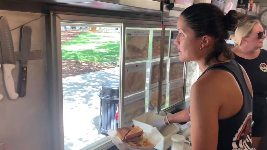 Melt Machine food truck manager Megan Torbio serves up gourmet grilled cheese sandwiches and melts. 