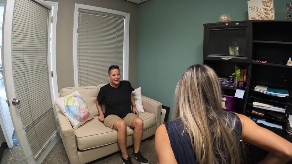 Kelly Lajb talks with therapist at Footprints Beachside Recovery.