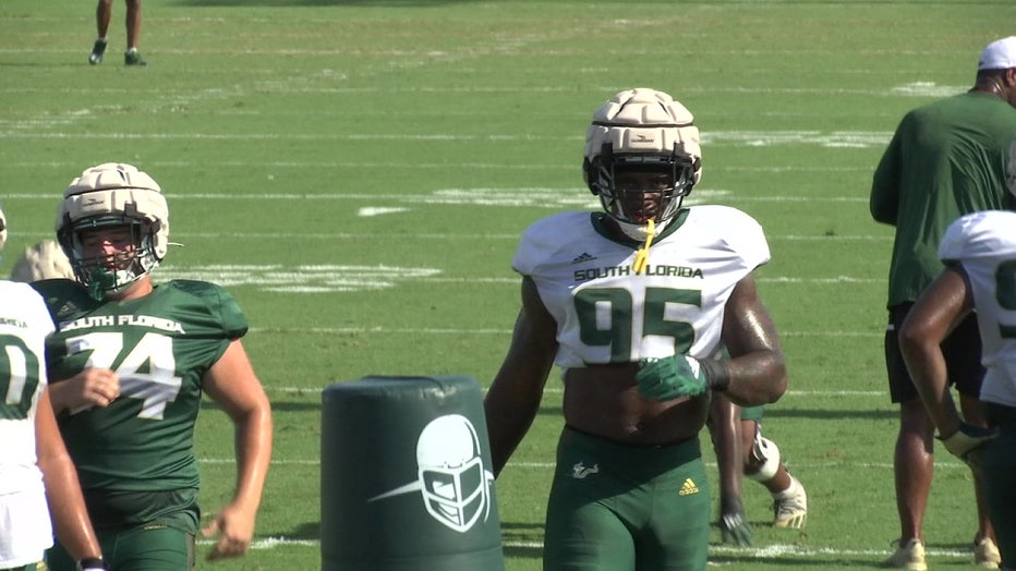Bayron Matos practices with the USF football team. 