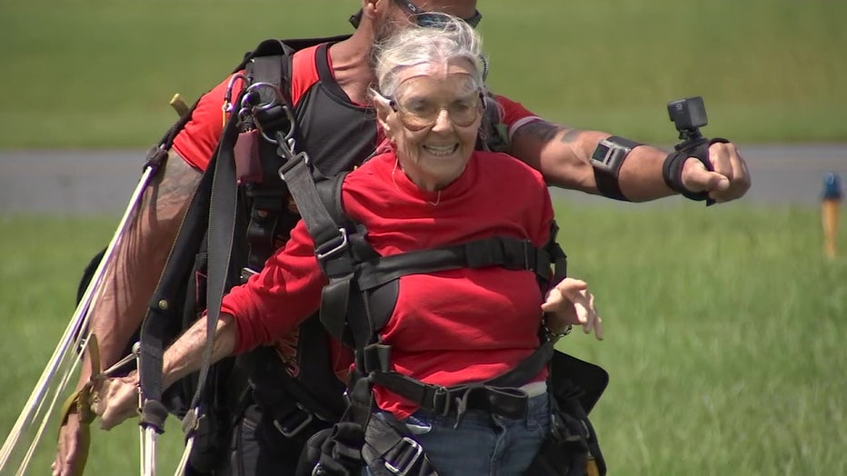 Rose Mary Bond lands after skydiving.