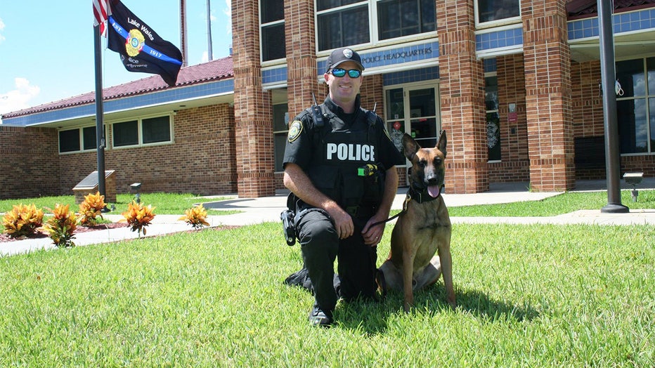 Photo: K9 Max with his handler in 2016