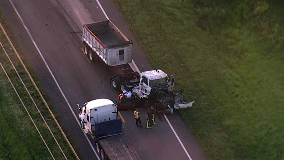 Photo: Still image of SkyFOX aerials show the destroyed vehicle partially underneath the front cab of the semi.