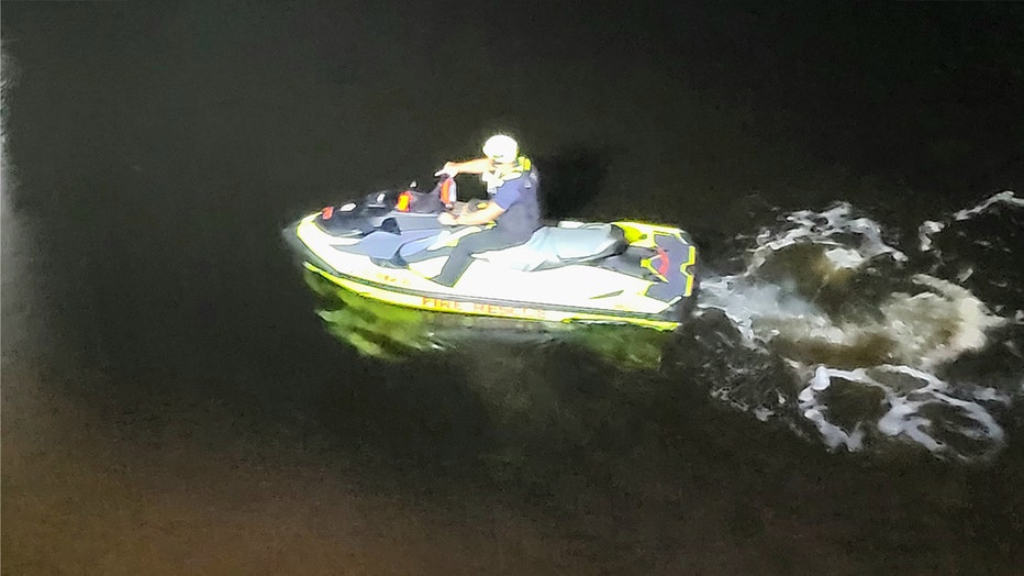 Photo: Hillsborough County first responder head out on Little Manatee River to rescue driver.