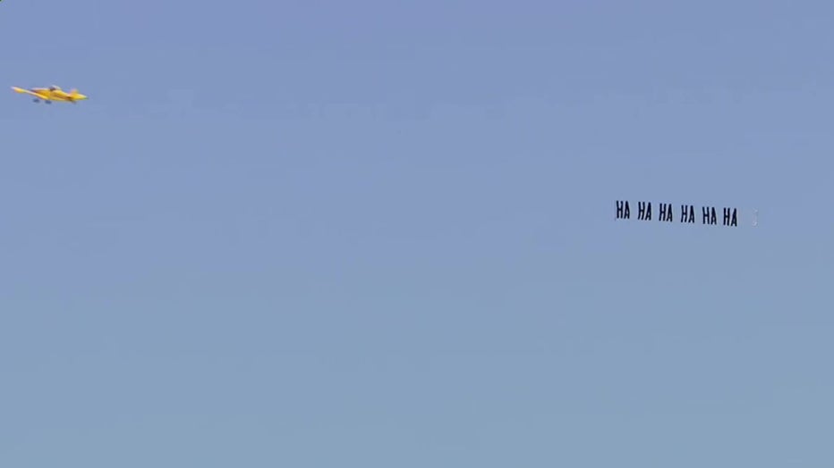 Photo: A pilot flew a plane carrying a banner with the message "ha ha ha ha ha" over former President Donald Trump's Mar-a-Lago estate following the FBI's execution of a search warrant at the Palm Beach, Florida property.