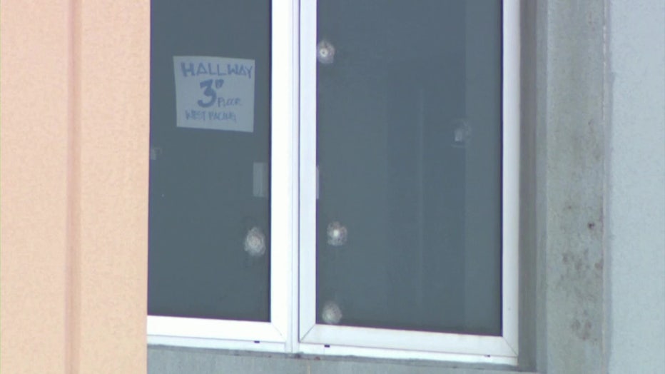 Photo: Multiple bullet holes riddle a third-floor window in the 1200 building at Marjory Stoneman Douglas High School in Parkland, Florida, where 17 students and staff were murdered in 2018.