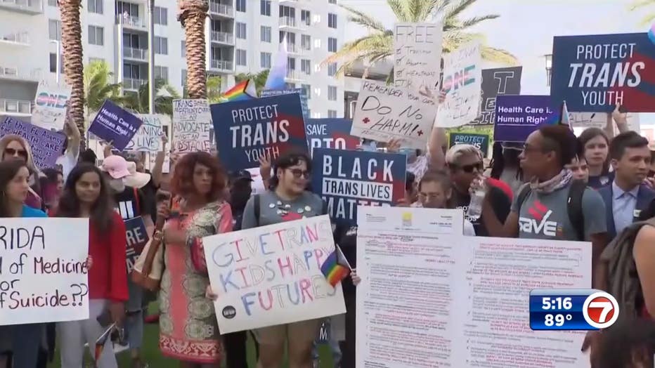 Photo: Protesters outside a Florida Board of Medicine meeting on August 5, 2022, in Broward County, Florida. The Board agreed to take a petition approved by Gov. Ron DeSantis and filed by the Florida Department of Health that would ban doctors from performing gender-reassignment surgery or providing treatments such as puberty blockers and hormone therapy to transgender minors.