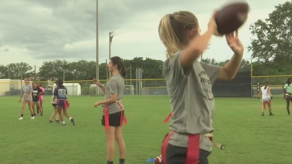 Girls on the Alonso and Robinson High Schools flag football team are playing against each other on national television. 