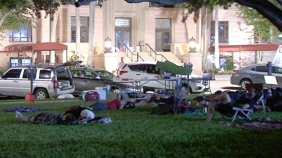 Photo: Protesters sleeping in grassy area outside St. Pete City Hall