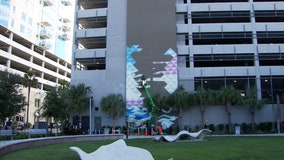 St. Pete artist creating 70-foot mural on Channelside building
