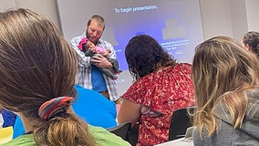 Professor comforts student’s crying baby while teaching class