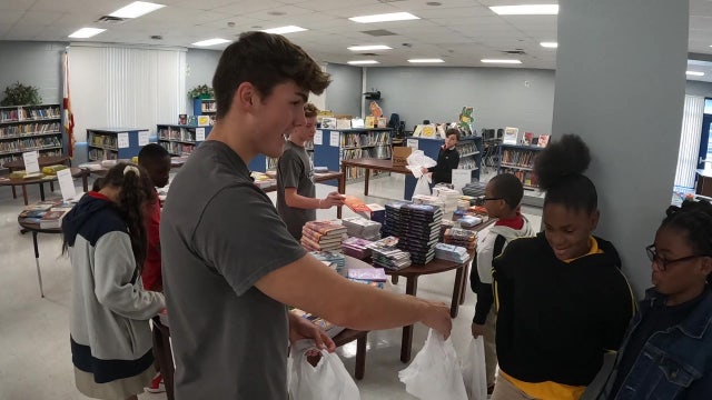 Brothers share their love of reading with under-served students