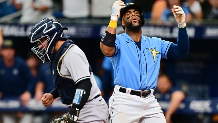 Yandy Diaz #2 of the Tampa Bay Rays reacts to a strikeout to lose the game 2-1 against the New York Yankees at Tropicana Field on September 04, 2022 in St Petersburg, Florida.