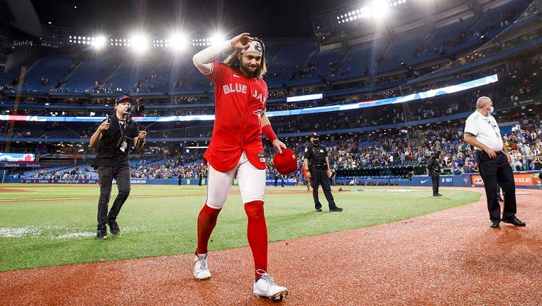 Bo Bichette of the Toronto Blue Jays walks to the dugout before News  Photo - Getty Images