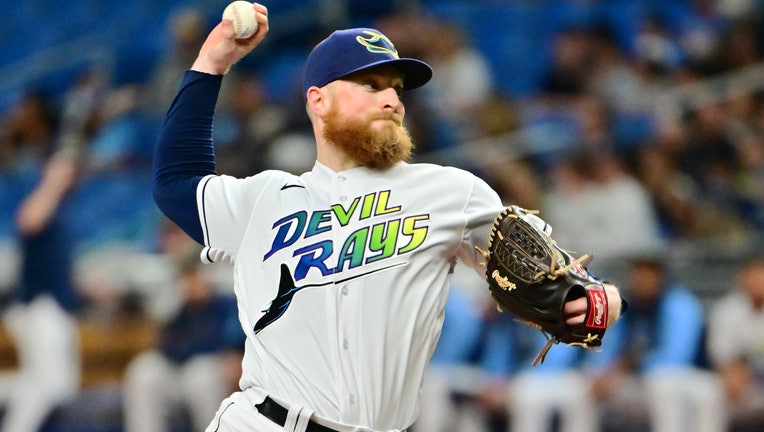 Drew Rasmussen #57 of the Tampa Bay Rays delivers a pitch to the Toronto Blue Jays in the first inning at Tropicana Field on September 24, 2022 in St Petersburg, Florida. 