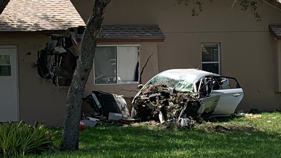 A 57-year-old Port Richey man was killed after losing control of his car and crashing into a tree and a house.