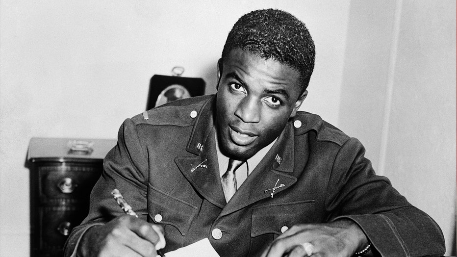 Jackie Robinson, in military uniform, becomes the first African American to sign with a white professional baseball team. He signs a contract with the minor league club in Montreal, a farm team for the Brooklyn Dodgers.