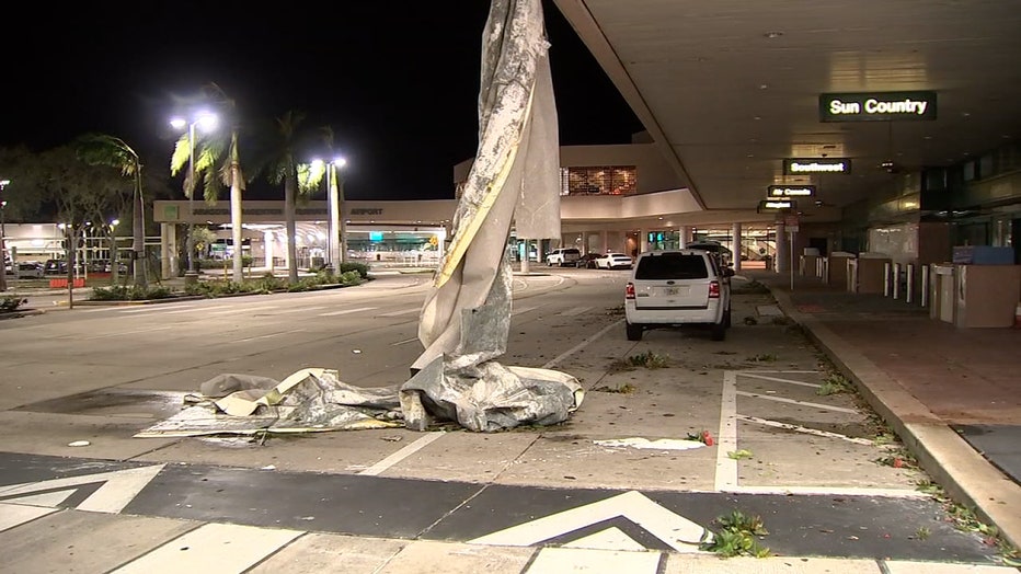 Photo: Rick Piccolo, the president and executive officer of the Sarasota Bradenton International Airport, said this is just a "small part" of the roof membrane that ripped off during Ian. The rest is still on the roof.