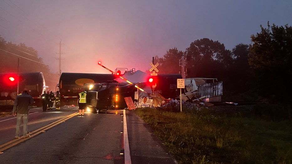 There were no injuries reported after a train collided with a semi-truck on Sunday morning in Lakeland. Photo courtesy of Polk County Fire Rescue. 