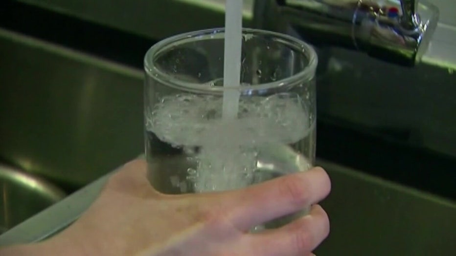 Water fills a glass.