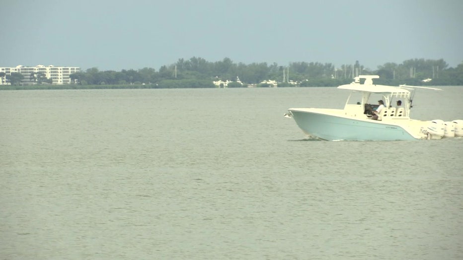 A boat travels on Sarasota Bay. 