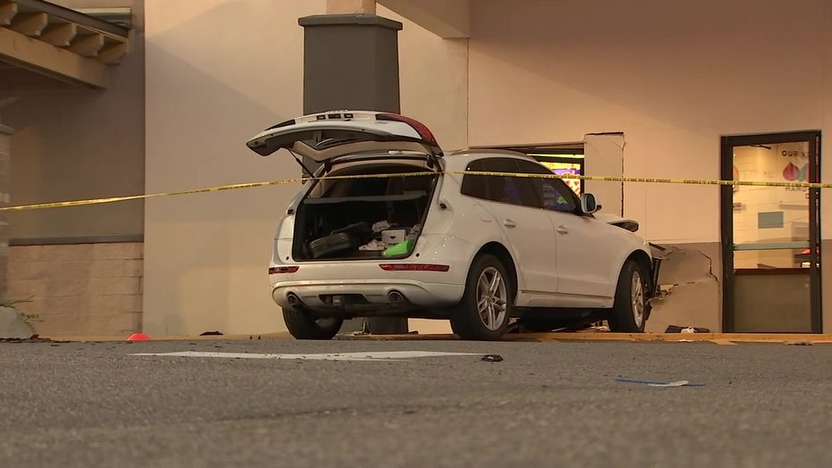 Four people, including a juvenile were hospitalized after a vehicle crashed into Chuck E. Cheese in Brandon shortly after gunfire erupted Saturday evening.