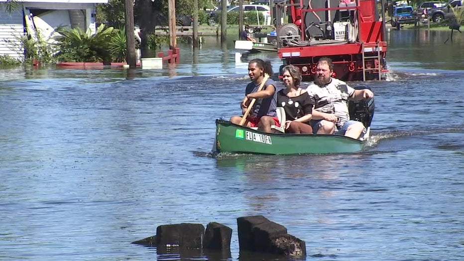 Neighbors in the Riverview community of Wauchula used their boats to shuttle people to and from their homes.