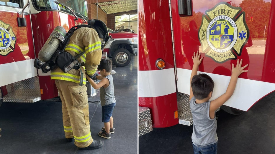 Photo: Junie, who is blind, takes a tour of the Plant City fire station, touching fire trucks in order to visualize them in his mind.