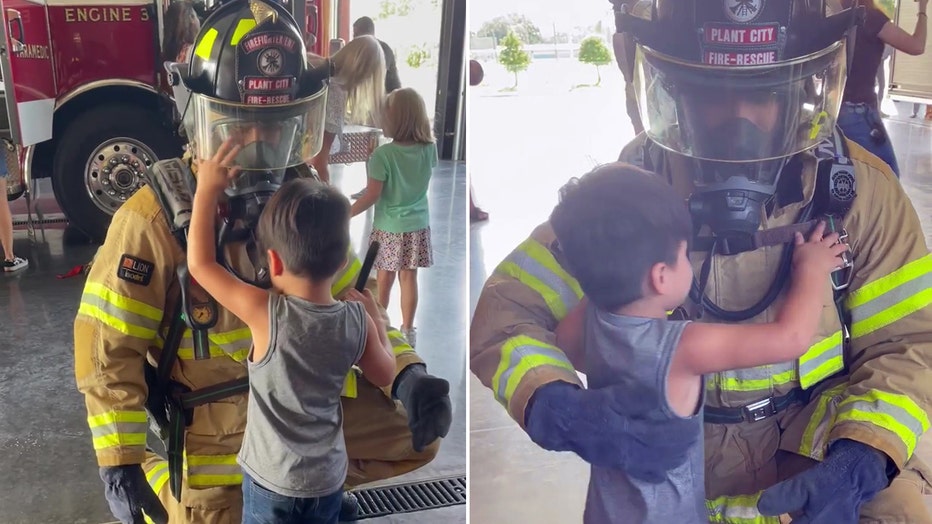 Photo: Junie used his hands to see, running them over each part of the firefighter's uniform from his mask to his oxygen tank to get an image in his mind. As he touched each piece of equipment, the firefighter explained what it was and how it functioned.