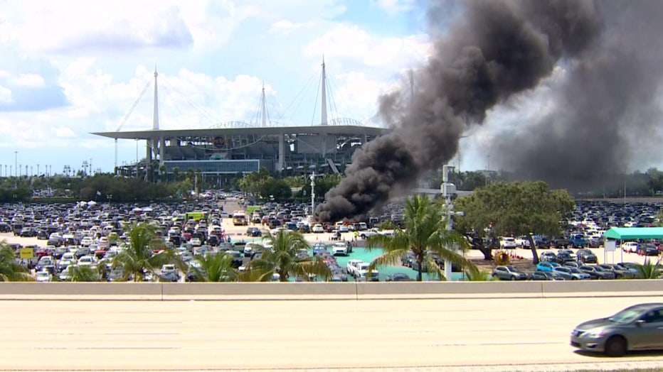 Officials say a tailgate party grill may be to blame for fire outside Miami stadium